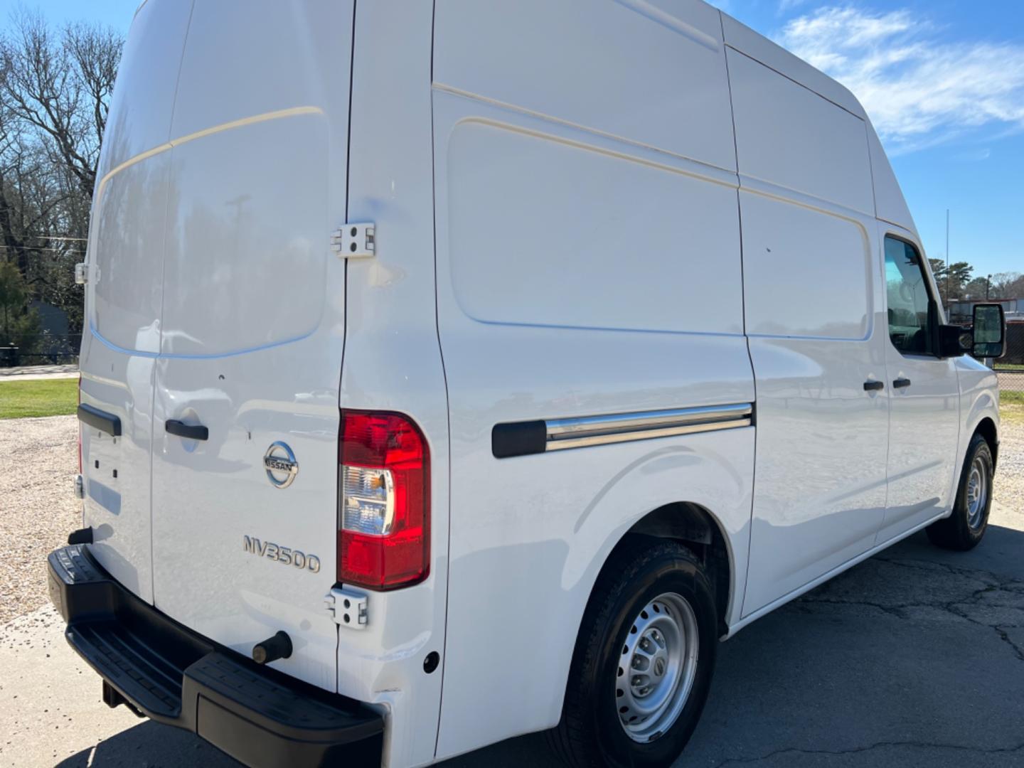 2018 White /Gray Nissan NV Cargo (1N6AF0LY1JN) with an 5.6 V8 engine, Automatic transmission, located at 4520 Airline Hwy, Baton Rouge, LA, 70805, (225) 357-1497, 30.509325, -91.145432 - 2018 Nissan NV 3500 Cargo 5.6 V8 Gas, 175K Miles, Power Windows, Locks & Mirrors, Aluminum Shelving, Spitz Lift (Needs Connector),Tow Pkg. NO IN HOUSE FINANCING. FOR INFO PLEASE CONTACT JEFF AT 225 357-1497 CHECK OUT OUR A+ RATING WITH THE BETTER BUSINESS BUREAU WE HAVE BEEN A FAMILY OWNED AND OPERA - Photo#5